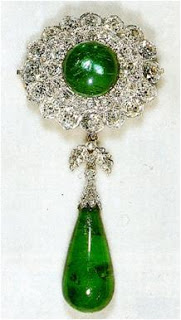 Round Cambridge Emerald brooch